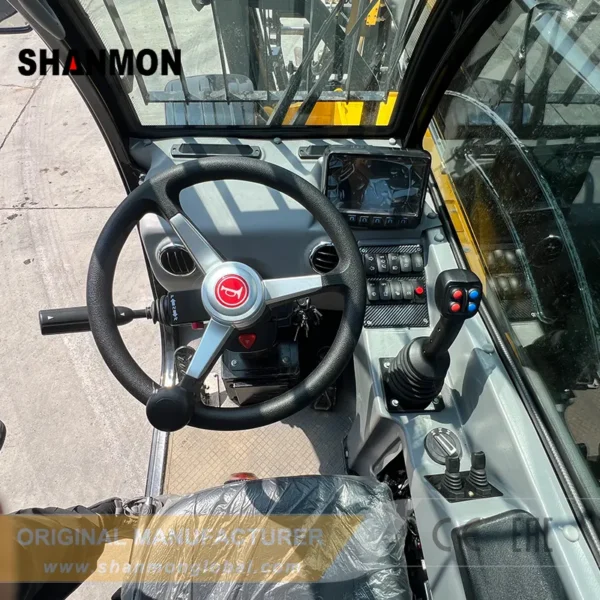 Shanmon 3511J telescopic handler cabin, showing steering wheel and instrument panel